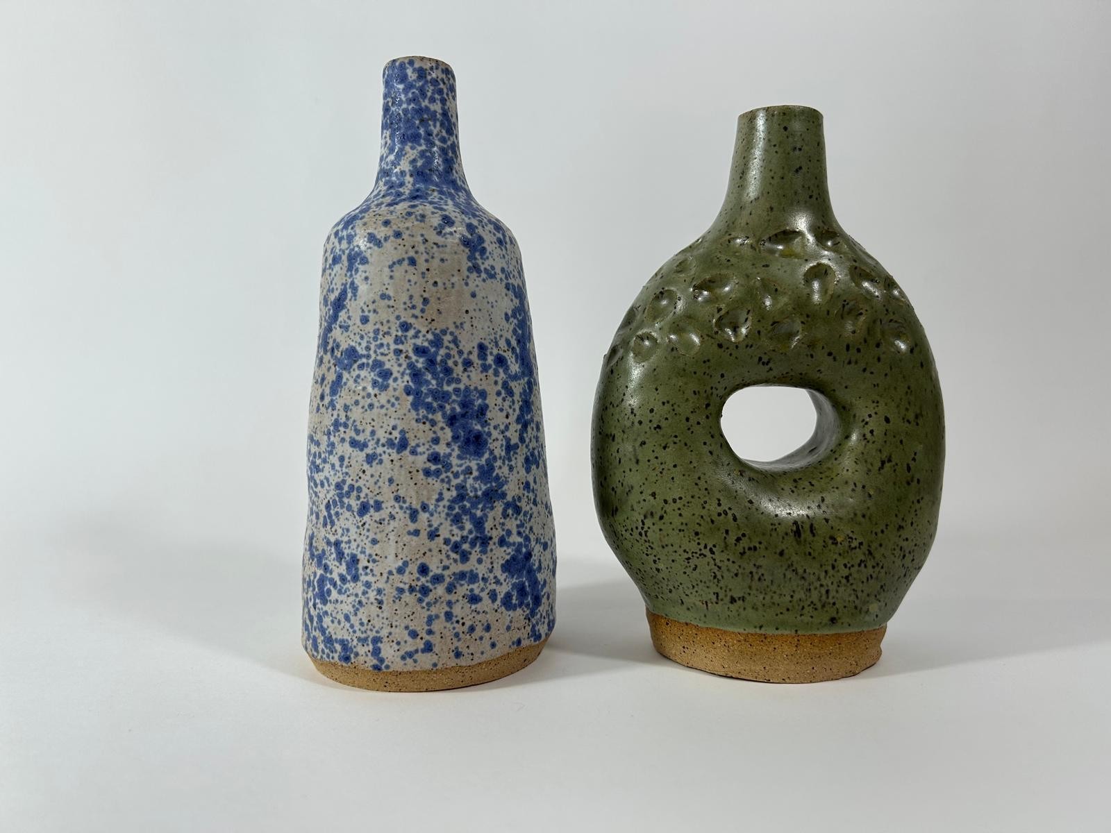 Two vessels with green and blue speckled glazes